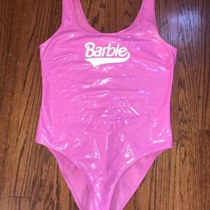 I am selling this light pink Barbie leather body suit!!!!!